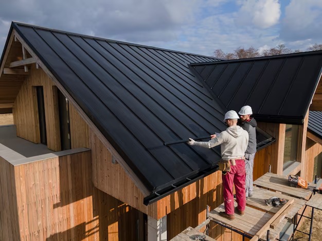 36832imgi_125_full-shot-roofers-working-together-with-helmets_23-2149343707.jpg